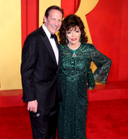 Percy Gibson and Joan Collins